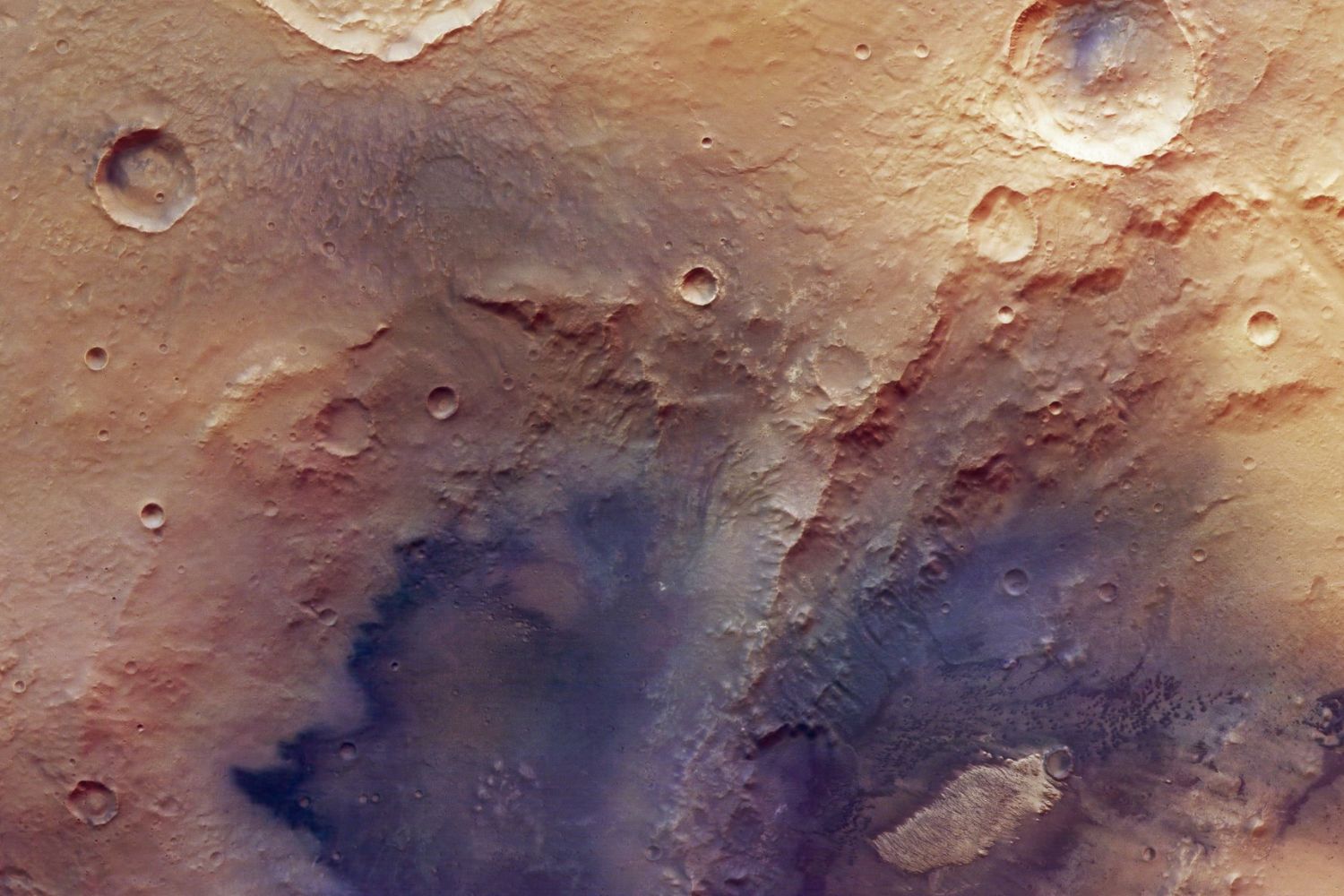 Uma mancha escura está crescendo em Marte e nem os cientistas sabem exatamente por quê