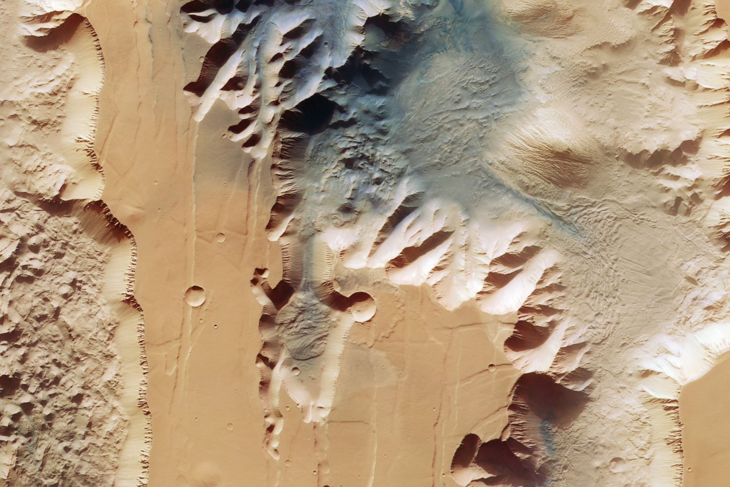 Uma mancha escura está crescendo em Marte e nem os cientistas sabem exatamente por quê