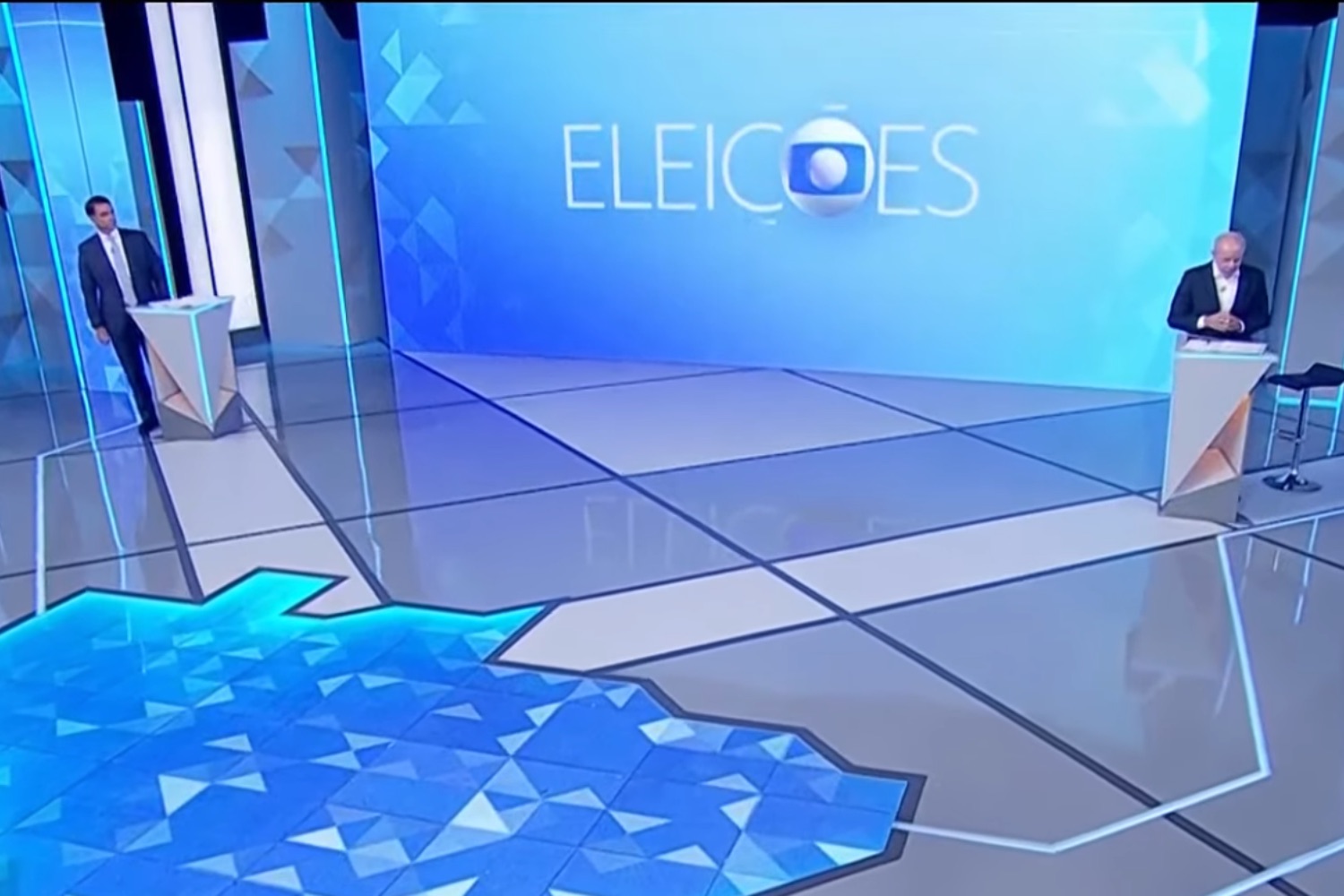 Debate na Globo: Lula e Flávio Bolsonaro trocam ataques sobre salário mínimo, SUS e dívidas dos brasileiros